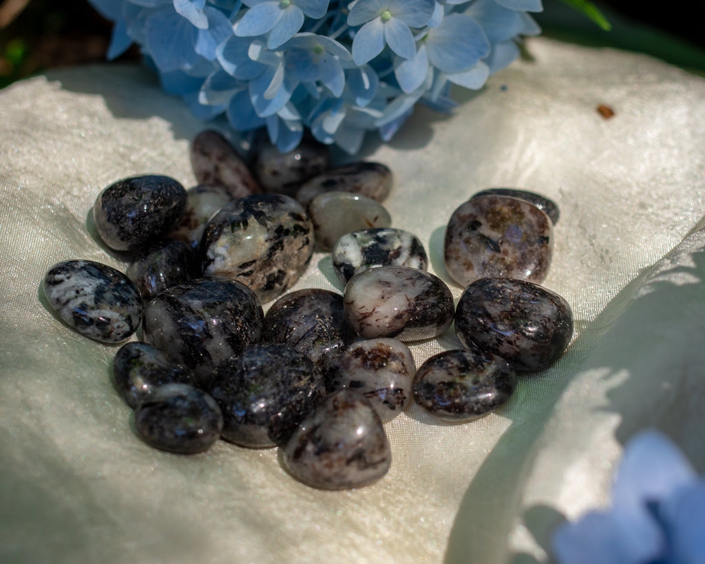 Tumbled Astrophyllite for Moving Beyond Obstacles - The Crystal Cavern