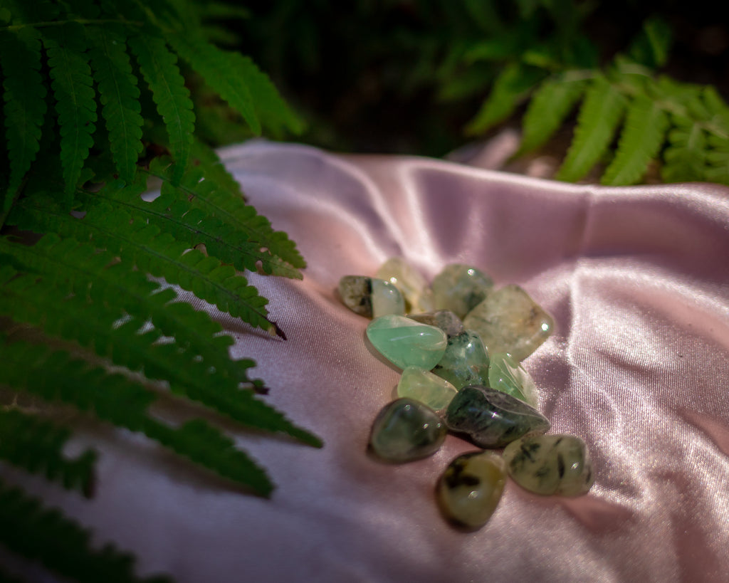 Prehnite in Epidote Tumbles for Potent Healing and Growth - The Crystal Cavern